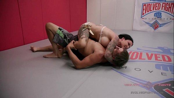 Tattooed MILF Jen Hexxx locks horns with Racker in a raunchy mixed gender wrestling battle.